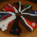 Group Shots of Chucks  Core and seasonal high top chucks with red retro shoelaces, shot 5.
