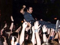 Fall Out Boy  Crowd surfing at a concert .