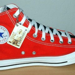 Red/Black 2-Tone High Top Chucks  Red and black left 2-tone high top, new with tag, inside patch view.