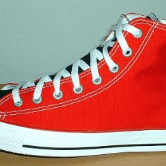 Red/Black 2-Tone High Top Chucks  Red and black left 2-tone high top, outside view.