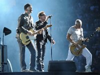U2  Guitar player The Edge, Singer Bono and bass player Adam Clayton of U2 performing at Qwest Field on June 4, 2011 in Seattle, Washington. : Music