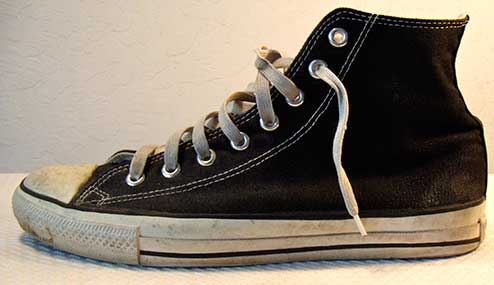 dirty black high top chuck