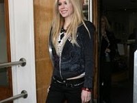 Avril Lavigne  Avril leaving a conference room.
