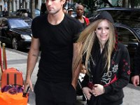 Avril Lavigne  Avril and her boyfriend entering a Paris restaurant.