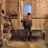 Austin Asher Stills From Shazam!  In the bathroom Billy opens his backpack.