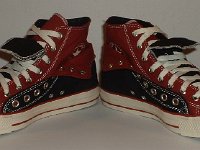 Black and Brick Red Double Upper High Top Chucks  Angled front view of folded down black and brick red double upper high tops.