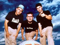 Blink 182  Posed shot of the band in front of a golf ball.
