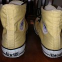 Brad Deniston Collection of Chucks  Rear view of banana yellow high tops.