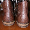 Brad Deniston Collection of Chucks  Rear view of brown leather high tops.