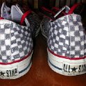Brad Deniston Collection of Chucks  Rear view of black and white checkered low cut chucks.