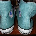 Brad Deniston Collection of Chucks  Rear view of green high top chucks.