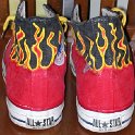 Brad Deniston Collection of Chucks  Rear view of painted red high top chucks.
