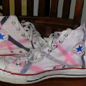 Brad Deniston Collection of Chucks  Inside patch views of painted white high top chucks.