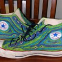 Brad Deniston Collection of Chucks  Inside patch views of painted white high top chucks.