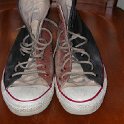 Brad Deniston Collection of Chucks  Front view of painted high tops.