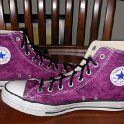 Brad Deniston Collection of Chucks  Inside patch views of purple satin high top chucks.