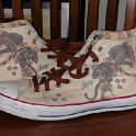 Brad Deniston Collection of Chucks  Outside views of Sailor Jerry high top chucks.