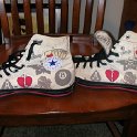 Brad Deniston Collection of Chucks  Left side views of Sailor Jerry high top chucks.