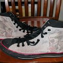 Brad Deniston Collection of Chucks  Outide views of Sailor Jerry high top chucks.