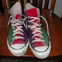 Brad Deniston Collection of Chucks  Top view of green, red and purple tricolor high tops.