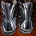 Brad Deniston Collection of Chucks  Rear view of zebra prinit high tops.