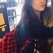 Camila Cabello  Camila posing with a fan while wearing black chucks