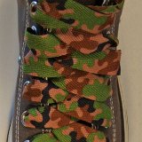 Camouflage Shoelaces on Chucks  Army Green Camouflage print shoelaces on a charcoal grey high top.