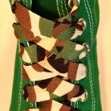 Camouflage Print Shoelaces On Chucks  Desert camouflage print shoelaces on kelly green high top chucks.