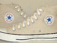 Cargo High Top Chucks  Khaki cargo high tops, Chuck Taylor logo side view.