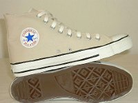 Cargo High Top Chucks  Khaki cargo high tops, Chuck Taylor logo and sole views.