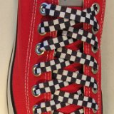 Checkered Laces on Chucks  Red low top chuck with 45x3/8 inch black and white checkered shoelaces.