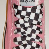 Black and White Checkered Shoelaces on Chucks  Pink low top chuck with black and white checkered shoelaces.