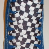 Black and White Checkered Shoelaces on Chucks  Royal blue high top with black and white checkered shoelaces.