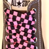 Black and Pink Checkered Shoelaces on Chucks  Charcoal grey low top chuck with black and pink checkered shoelaces.