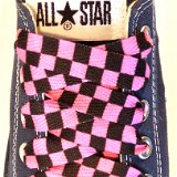 Black and Pink Checkered Shoelaces on Chucks  Navy blue low top chuck with black and pink checkered shoelaces.