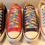 Rainbow Checkered Print Shoelaces On Chucks  Rainbow checkered print shoelaces on core color low top chucks.