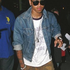 Chris Brown  Chris Brown wearing red high top chucks.