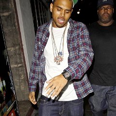 Chris Brown  Chris Brown spotted wearing grey chucks on the street.