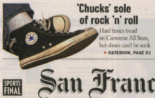 a pair of balck high top chucks on the cover of the SF Chronicle