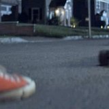 Chucks in the Film Detention  Riley kicks the skateboard back to Clapton.