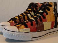 The Doors High Top Chucks  Angled siide view of orange and tan patches Doors high tops.