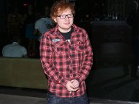 Ed Sheeran  Ed Sheeran outside at night.