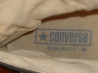 Evolution of the Insole  Interior of a 1960s black high top showing the inner sole logo, canvas and ankle support.