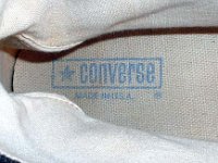Evolution of the Insole  Close up of the insole, heel guard, and inner canvas inside a 1980s black high top.
