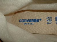 Evolution of the Insole  Closeup of the insole and inner canvas of a late 1990s black high top.