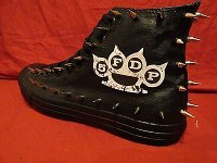 Five Finger Death Punch  Spiked black monochrome high tops with the band logo.