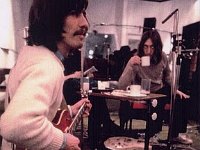 George Harrison  George Harrison wearing black chucks while recording with the Beatles, shot 2.