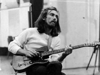 George Harrison  George Harrison wearing Jack Purcell’s during a recording session.