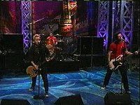 Green Day  Green Day performing in their chucks.