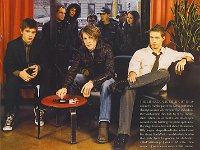 Hanson  Posed shot of the band with Zac wearing black high top chucks.